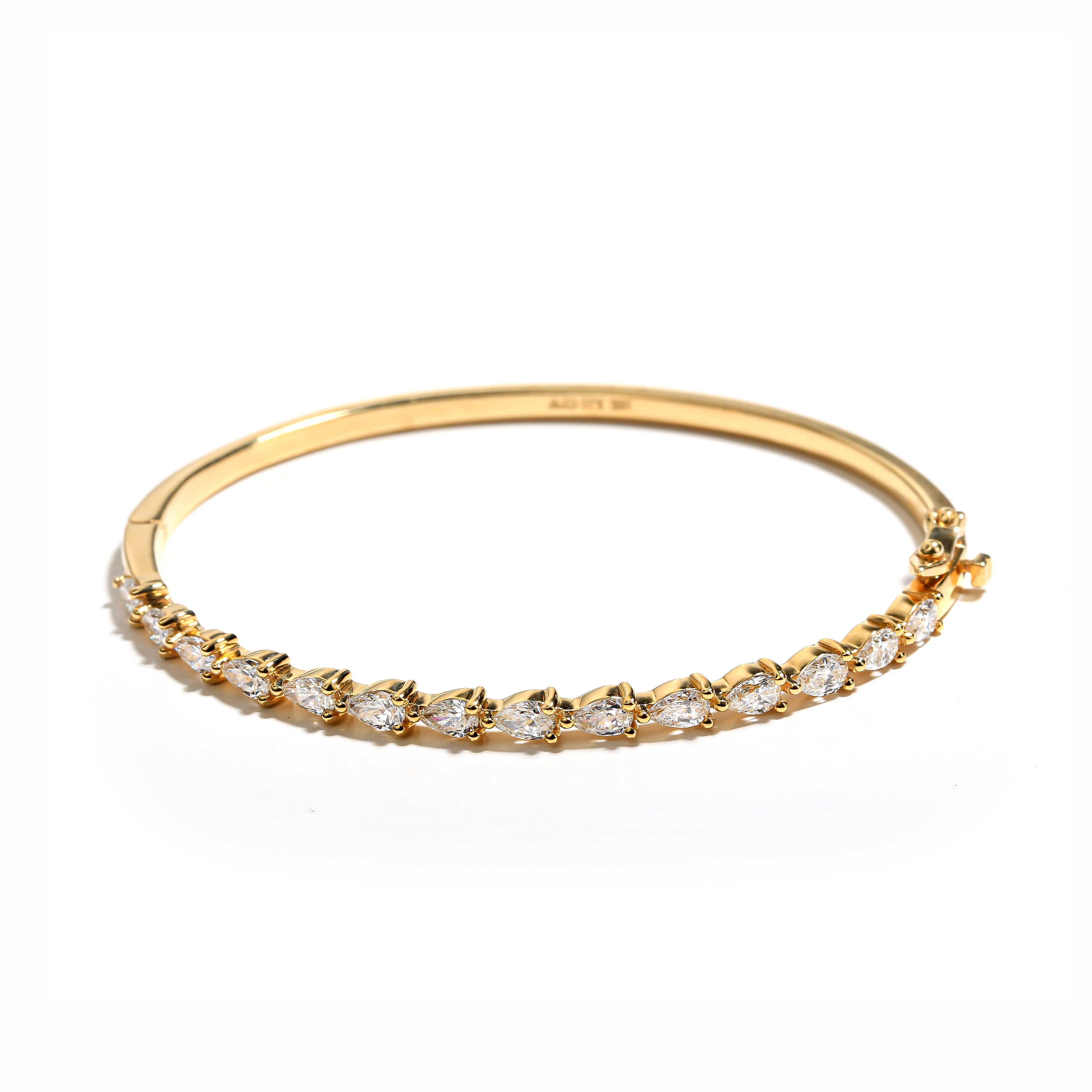 Pulse-Raising Pear-Shape Diamond Bangle